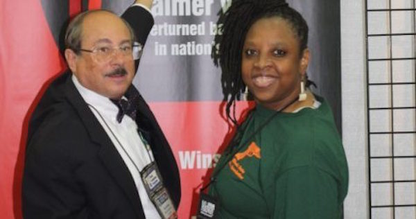 SAF’s Alan Gottlieb with Rhonda Ezell, lead plaintiff in a lawsuit challenging Chicago’s restrictive gun law. (Dave Workman photo)